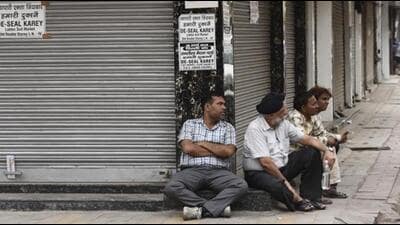 New Delhi, India - April 6, 2018: Shopkeepers in Amar Colony Lajpat Nagar got alerted and gathered after they heard about the sealing team will arrive in the market for sealing, in New Delhi, India, on Friday, April 6, 2018. (Photo by Burhaan Kinu/ Hindustan Times) (Burhaan Kinu/HT PHOTO) New Delhi, India - April 6, 2018: Shopkeepers in Amar Colony Lajpat Nagar got alerted and gathered after they heard about the sealing team will arrive in the market for sealing, in New Delhi, India, on Friday, April 6, 2018. (Photo by Burhaan Kinu/ Hindustan Times) (Burhaan Kinu/HT PHOTO)