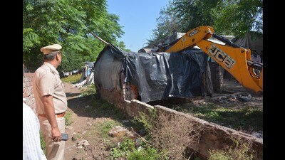 Police demolished house of a drug peddler at Kharak Mongoli, Panchkula, October 20. (Sant Arora/HT)