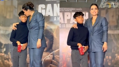 Kajol with son Yug at Ganapath screening in Mumbai. (Viral Bhayani) (Viral Bhayani) Kajol with son Yug at Ganapath screening in Mumbai. (Viral Bhayani) (Viral Bhayani)