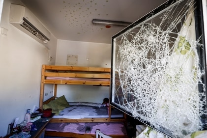 A damaged bedroom of children inside a family home in Kibbutz Nir Oz on October 19. (Reuters)
