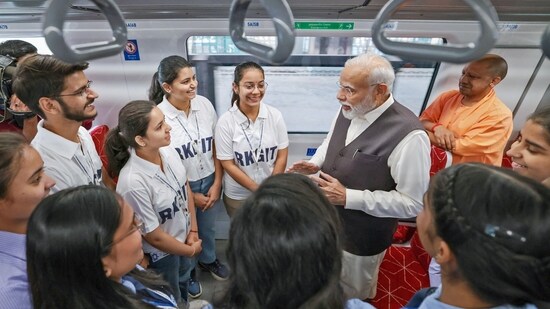 PM Modi interacts with school children at the Regional Rapid Train Namo Bharat in Ghaziabad.(ANI/PIB)