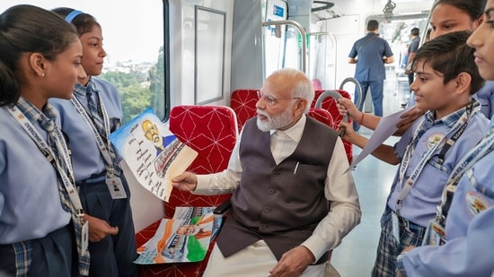 PM Narendra Modi travelled by Regional Rapid Train 'Namo Bharat' with co-passengers who shared their experiences, including on how this train service will have a positive impact.&nbsp;(ANI/PIB)