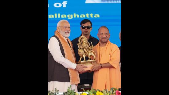 Prime Minister Narendra Modi with UP chief minister Yogi Adityanath during the inauguration ceremony of various developmental projects, after flagging off the ‘Namo Bharat’ train on the 17-km priority section of the country’s first Regional Rapid Transit System (RRTS) corridor, in Ghaziabad on Friday. (HT Photo)
