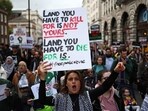 People take part in a 'March For Palestine', in London on October 21, 2023, to "demand an end to the war on Gaza". The UK has pledged its support for Israel following the bloody attacks by Hamas, which killed more than 1,400 people, and has announced that humanitarian aid to the Palestinians will be increased by a third -- an extra �10 million pounds ($12 million). Israel is relentlessly bombing the small, crowded territory of Gaza, where more than 3,400 people have been killed, most of them Palestinian civilians, according to the local authorities. (Photo by HENRY NICHOLLS / AFP) People take part in a 'March For Palestine', in London on October 21, 2023, to "demand an end to the war on Gaza". The UK has pledged its support for Israel following the bloody attacks by Hamas, which killed more than 1,400 people, and has announced that humanitarian aid to the Palestinians will be increased by a third -- an extra �10 million pounds ($12 million). Israel is relentlessly bombing the small, crowded territory of Gaza, where more than 3,400 people have been killed, most of them Palestinian civilians, according to the local authorities. (Photo by HENRY NICHOLLS / AFP)