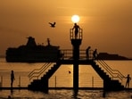 People wait to dive at the 