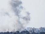 Smoke rises in the air following bombings.