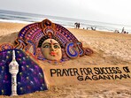 Puri: Sand sculpture of Goddess Durga with message Prayer for Success of Gaganyaan, created by the sand artist Sudarsan Pattnaik, at Puri Beach in, Friday, Oct. 20, 2023. 