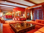 The four-bedroom, five-bathroom house features a sunken living room, wet bar and kidney-shaped pool. The four-bedroom, five-bathroom house features a sunken living room, wet bar and kidney-shaped pool.
