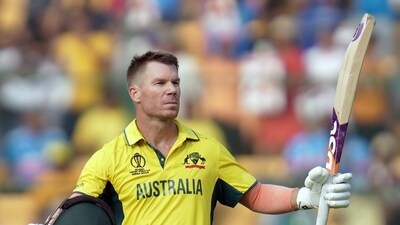 Bengaluru, Oct 20 (ANI): Australia's David Warner raises his bat after completing his century during their match against Pakistan in the ICC Men's Cricket World Cup 2023, at M.Chinnaswamy Stadium, in Bengaluru on Friday. (ANI Photo) (ANI ) Bengaluru, Oct 20 (ANI): Australia's David Warner raises his bat after completing his century during their match against Pakistan in the ICC Men's Cricket World Cup 2023, at M.Chinnaswamy Stadium, in Bengaluru on Friday. (ANI Photo) (ANI )