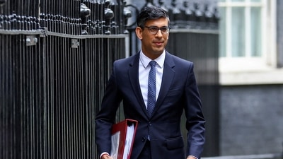 British Prime Minister Rishi Sunak walks at Downing Street in London, Britain. (REUTERS)