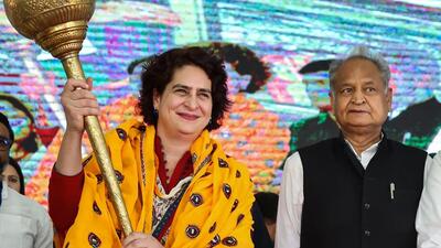 Congress leader Priyanka Gandhi Vadra with Rajasthan chief minister Ashok Gehlot during a public meeting at Sikrai in poll bound Rajasthan on Friday. (PTI)