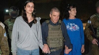 In this photo provided by the Government of Israel, Judith Raanan, right, and her 17-year-old daughter Natalie are escorted by Israeli soldiers and Gal Hirsch, Prime Minister Benjamin Netanyahu's special coordinator for returning the hostages, as they return to Israel from captivity in the Gaza Strip, Friday, Oct. 20, 2023. Hamas released the pair in what it said was a goodwill gesture late Friday, nearly two weeks after they were captured in a bloody cross-border raid by the Islamic militant group. The Hamas attack sparked a war that is entering its third week, and Hamas is believed to still be holding some 200 people hostage. (Government of Israel via AP Photo) (AP) In this photo provided by the Government of Israel, Judith Raanan, right, and her 17-year-old daughter Natalie are escorted by Israeli soldiers and Gal Hirsch, Prime Minister Benjamin Netanyahu's special coordinator for returning the hostages, as they return to Israel from captivity in the Gaza Strip, Friday, Oct. 20, 2023. Hamas released the pair in what it said was a goodwill gesture late Friday, nearly two weeks after they were captured in a bloody cross-border raid by the Islamic militant group. The Hamas attack sparked a war that is entering its third week, and Hamas is believed to still be holding some 200 people hostage. (Government of Israel via AP Photo) (AP)