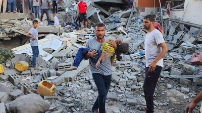 Palestinian carries a child killed in an airstrike on the buildings of Abu Asad family in Deir el-Balah, southern Gaza Strip, Saturday, Oct. 21, 2023. (AP Photo/Hassan Eslaiah) (AP) Palestinian carries a child killed in an airstrike on the buildings of Abu Asad family in Deir el-Balah, southern Gaza Strip, Saturday, Oct. 21, 2023. (AP Photo/Hassan Eslaiah) (AP)