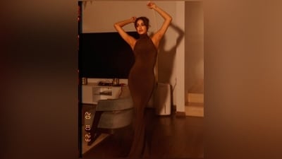 Meanwhile, Janhvi chose feathered brows, subtle mocha eye shadow, mascara on the lashes, glossy nude lip shade, rouge on the cheekbones, beaming highlighter, and light kohl for the glam picks. A centre-parted messy bun gave the finishing touch to her red carpet look.&nbsp; (Instagram)