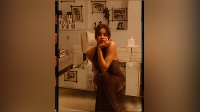 Meanwhile, Janhvi's stunning outfit comes in a chic deep brown shade and is from the shelves of the innovative clothing label Norma Kamali. It features a turtle neckline, a sleeveless halter silhouette with a backless design, a floor-grazing hem length, and a figure-hugging fit accentuating Janhvi's enviable curves.&nbsp; (Instagram)