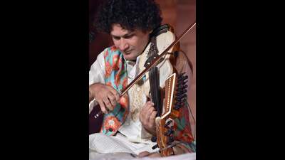 Naviin Gandharva who is the only one playing the unique instrument called the Belabaharr. (HT photo) Naviin Gandharva who is the only one playing the unique instrument called the Belabaharr. (HT photo)