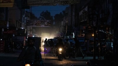 A dark street in a commercial area in Lahore, Pakistan. (Bloomberg) A dark street in a commercial area in Lahore, Pakistan. (Bloomberg)