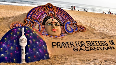 Puri: Sand sculpture of Goddess Durga with message Prayer for Success of Gaganyaan, created by the sand artist Sudarsan Pattnaik, at Puri Beach in, Friday, Oct. 20, 2023. (PTI) Puri: Sand sculpture of Goddess Durga with message Prayer for Success of Gaganyaan, created by the sand artist Sudarsan Pattnaik, at Puri Beach in, Friday, Oct. 20, 2023. (PTI)