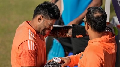 India's Suryakumar Yadav receives medical assistance after getting hurt during a practice session ahead of the ICC Men's Cricket World Cup 2023 match between India and New Zealand (PTI) India's Suryakumar Yadav receives medical assistance after getting hurt during a practice session ahead of the ICC Men's Cricket World Cup 2023 match between India and New Zealand (PTI)
