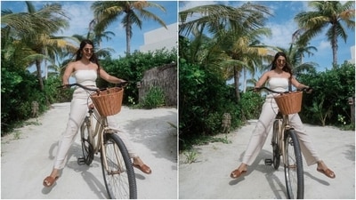 Earlier, Pooja had shared photos of her Maldivian vacation. These pictures show her basking in the sun dressed in a black bralette, acid-washed grey denim shorts, and a black and white striped shirt. She styled the ensemble with shades and open locks. (Instagram) Earlier, Pooja had shared photos of her Maldivian vacation. These pictures show her basking in the sun dressed in a black bralette, acid-washed grey denim shorts, and a black and white striped shirt. She styled the ensemble with shades and open locks. (Instagram)