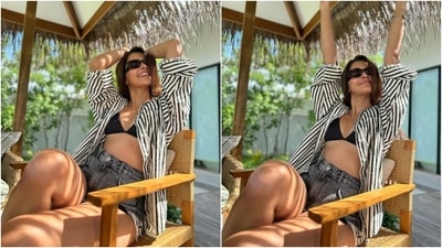 In these pictures, Pooja looks stunning in a ruched tube top and cream-coloured linen pants. Tan sandals, statement rings, leaf-pattern earrings, a sleek bracelet, retro sunglasses, a half-tied hairdo, and minimal glam picks completed the look. (Instagram) In these pictures, Pooja looks stunning in a ruched tube top and cream-coloured linen pants. Tan sandals, statement rings, leaf-pattern earrings, a sleek bracelet, retro sunglasses, a half-tied hairdo, and minimal glam picks completed the look. (Instagram)