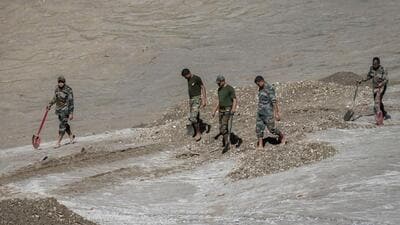 The army, which launched a combing operation soon after the flood to locate the buried explosives, has already diffused more than 1,200 explosives in around 200 locations in Sikkim and West Bengal. (AP) The army, which launched a combing operation soon after the flood to locate the buried explosives, has already diffused more than 1,200 explosives in around 200 locations in Sikkim and West Bengal. (AP)