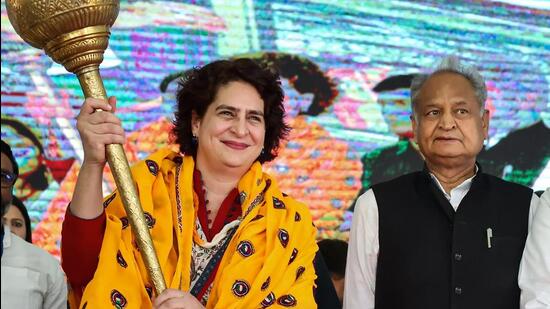 Congress leader Priyanka Gandhi Vadra with Rajasthan chief minister Ashok Gehlot during a public meeting at Sikrai in poll bound Rajasthan on Friday. (PTI)
