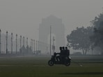 Smog seen engulfed during early hours of the morning on Kartvya Path leading in New Delhi.