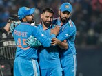 Mohammed Shami with with captain Rohit Sharma and KL Rahul celebrates the wicket of New Zealand's Daryl Mitchell Mohammed Shami with with captain Rohit Sharma and KL Rahul celebrates the wicket of New Zealand's Daryl Mitchell