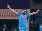 India's Mohammed Shami celebrates the wicket of New Zealand's Matt Henry. India's Mohammed Shami celebrates the wicket of New Zealand's Matt Henry.