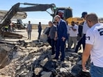 Syria's Prime Minister Hussein Arnous inspects damage at the runway of Damascus International Airport after an Israeli air strike. Syria's Prime Minister Hussein Arnous inspects damage at the runway of Damascus International Airport after an Israeli air strike.
