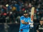 Virat Kohli playing a shot during the ICC Men's World Cup 2023 match between India and New Zealand at HPCA Stadium in Dharamshala. Virat Kohli playing a shot during the ICC Men's World Cup 2023 match between India and New Zealand at HPCA Stadium in Dharamshala.