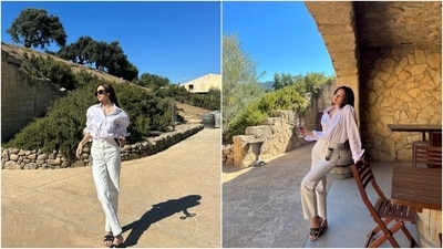 Lisa embraced a monotone style statement in a pinstriped button-down shirt and white denim jeans. While the blouse has a relaxed fitting and folded full-length sleeves, the bottoms have a high-rise waist and a straight-leg fitting. Lastly, a dainty chain, tinted sunglasses, statement rings, black slip-on sandals, open tresses, and minimal glam rounded it off. (Instagram) Lisa embraced a monotone style statement in a pinstriped button-down shirt and white denim jeans. While the blouse has a relaxed fitting and folded full-length sleeves, the bottoms have a high-rise waist and a straight-leg fitting. Lastly, a dainty chain, tinted sunglasses, statement rings, black slip-on sandals, open tresses, and minimal glam rounded it off. (Instagram)