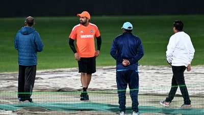 India's captain Rohit Sharma (2L) inspects the pitch during a practice session (AFP) India's captain Rohit Sharma (2L) inspects the pitch during a practice session (AFP)
