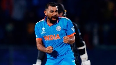 Mohammed Shami celebrates after taking the wicket of New Zealand's Matt Henry. (REUTERS)