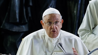 Pope Francis holds prayer for migrants and refugees in St. Peter's Square at the Vatican on October 19. (Reuters)