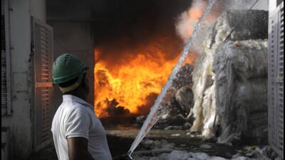The fire, which erupted at around 4.35pm, was controlled by 10pm after continuous firefighting efforts. (Sunil Ghosh /HT PHOTO) The fire, which erupted at around 4.35pm, was controlled by 10pm after continuous firefighting efforts. (Sunil Ghosh /HT PHOTO)
