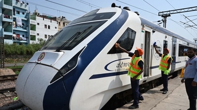 Workers clean a Vande Bharat Express train at Hazrat Nizamuddin railway station, (HT Photo/Arvind Yadav) Workers clean a Vande Bharat Express train at Hazrat Nizamuddin railway station, (HT Photo/Arvind Yadav)