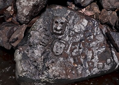 Ancient rock carvings reappeared in the region of the Lajes Archaeological Site due to the severe drought in Manaus, Amazonas State, northern Brazil, on October 21. (AFP)