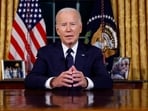 US President Joe Biden speaks from the Oval Office of the White House.