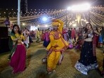Performers dance Garba during the Navaratri in Ahmedabad on October 21. Performers dance Garba during the Navaratri in Ahmedabad on October 21.