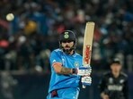 Virat Kohli plays a shot during the ICC Men's World Cup ODI cricket match between India and New Zealand.