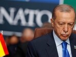 Turkish President Recep Tayyip Erdogan waits for the start of a round table meeting of the North Atlantic Council during a NATO summit in Vilnius, Lithuania in July.