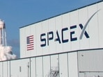 The SpaceX logo at the Kennedy Space Center in Cape Canaveral, Florida, US. The SpaceX logo at the Kennedy Space Center in Cape Canaveral, Florida, US.