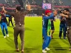 Irfan Pathan and Rashid Khan celebrate.