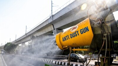 An anti-dust gun sprays water droplets to curb air pollution in New Delhi. (ANI) An anti-dust gun sprays water droplets to curb air pollution in New Delhi. (ANI)