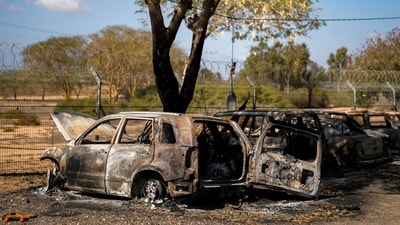 Burned cars next to homes that came under attack during a massive Hamas invasion into Kibbutz Nir Oz, Israel, Thursday, Oct. 19, 2023 (AP Photo/Francisco Seco) (AP) Burned cars next to homes that came under attack during a massive Hamas invasion into Kibbutz Nir Oz, Israel, Thursday, Oct. 19, 2023 (AP Photo/Francisco Seco) (AP)