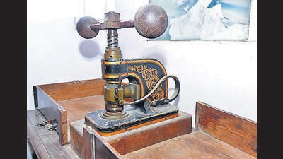 Made entirely of iron, the machine sits mounted on a wooden table. It is helmed by two iron spheres, one larger than the other, which connect the main leg of the seal. Its backbone is a curved black-and-gold structure with gold swirl patterns on it. While parts of the paint on the front have chipped and faded over a century and a half, the machine remains in perfect condition (HT PHOTO) Made entirely of iron, the machine sits mounted on a wooden table. It is helmed by two iron spheres, one larger than the other, which connect the main leg of the seal. Its backbone is a curved black-and-gold structure with gold swirl patterns on it. While parts of the paint on the front have chipped and faded over a century and a half, the machine remains in perfect condition (HT PHOTO)