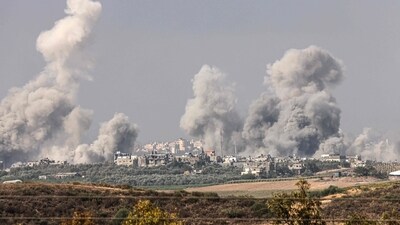 Israel-Hamas War: Smoke and debris ascending over the northern Gaza Strip following an Israeli strike. (AFP) Israel-Hamas War: Smoke and debris ascending over the northern Gaza Strip following an Israeli strike. (AFP)