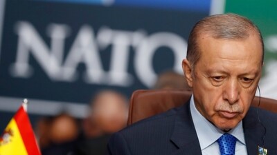 Turkish President Recep Tayyip Erdogan waits for the start of a round table meeting of the North Atlantic Council during a NATO summit in Vilnius, Lithuania in July. (AP)